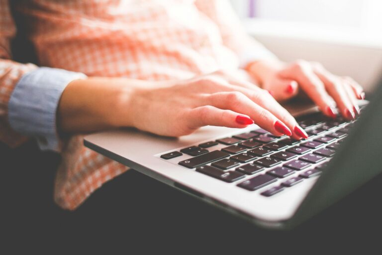 Woman Using Laptop Computer